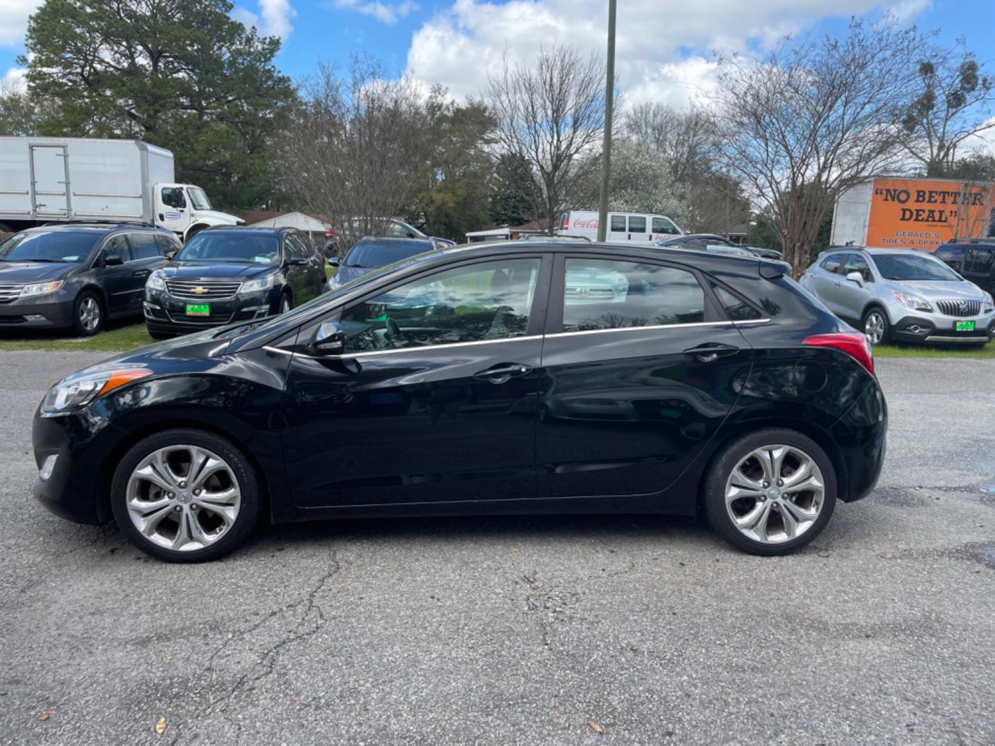 2014 BLACK HYUNDAI ELANTRA GT BASE (KMHD35LH8EU) with an 2.0L engine, Automatic transmission, located at 5103 Dorchester Rd., Charleston, SC, 29418-5607, (843) 767-1122, 36.245171, -115.228050 - Photo#3